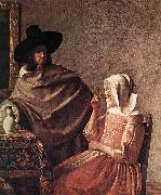 A Lady Drinking and a Gentleman (detail) ar VERMEER VAN DELFT, Jan